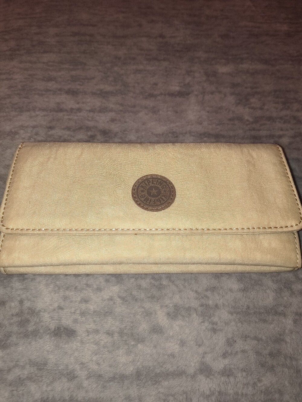 Kipling Tan Fold-Over Wallet with Logo Emblem
